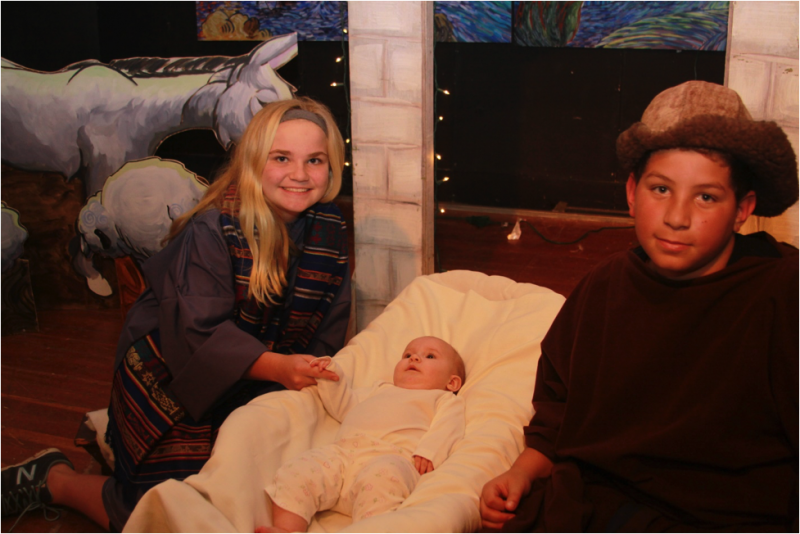 Emma Brown, Dakari Waite and Isabelle Waite depict Mary, Joseph and baby Jesus. COURTESY LISA DUNN/ALWAYSDUNNRIGHT PHOTOGRAPHY